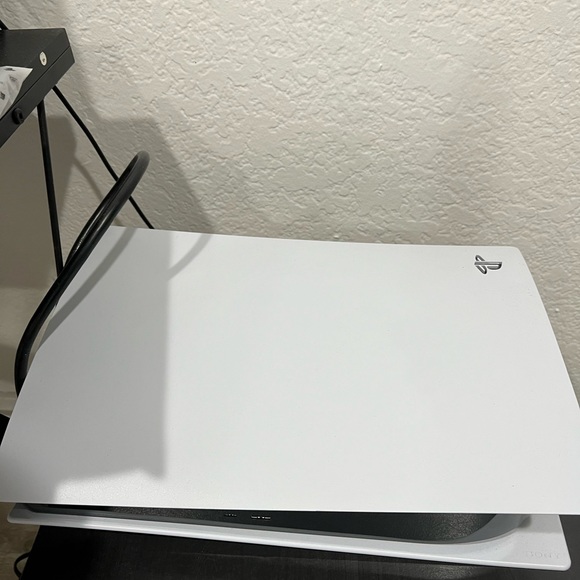 Ps5 used in excellent condition. Comes with hdmi and two controllers.
